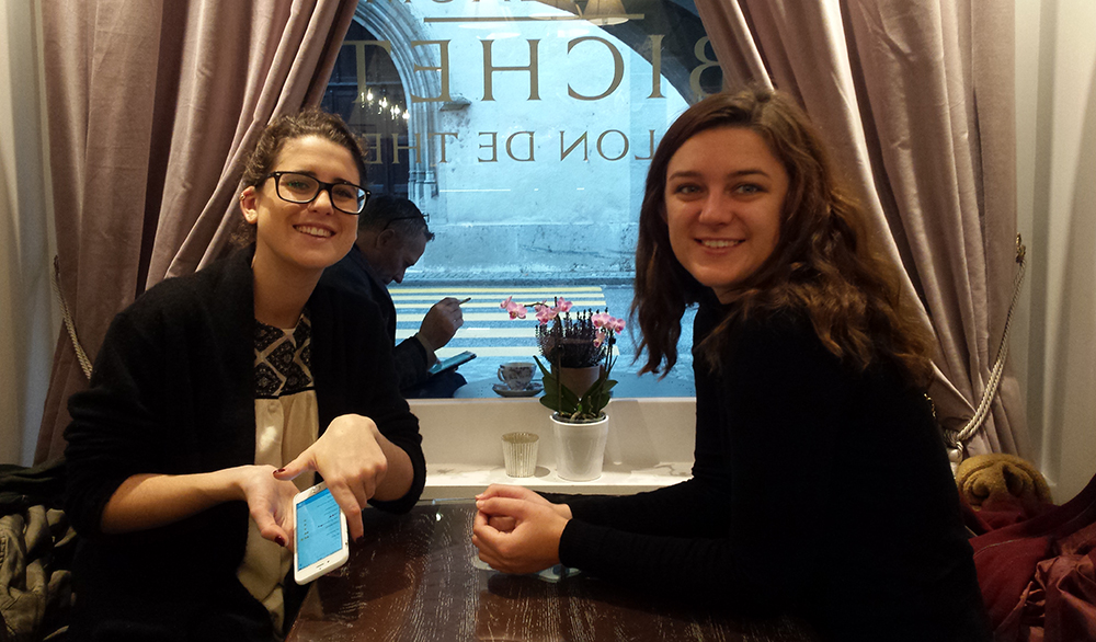 Mimi and Maya enjoying breakfast in a tea room in Copet