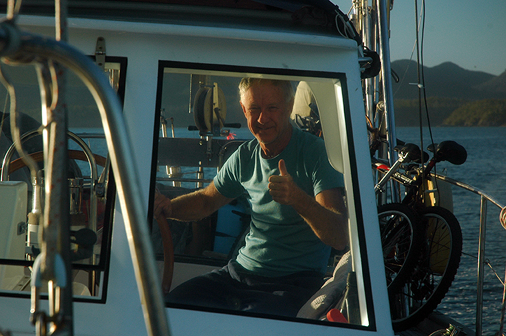 Neil at the helm going to Tofino in Clayoquot Sound